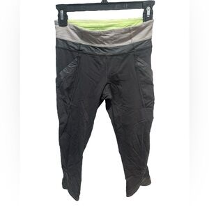 LULULEMON BLACK GRAY AND GREEN CROPPED LEGGINGS WITH POCKETS SIZE 4